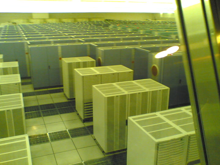 Racks of the Earth Simulator. Storage racks are visible in front of the window